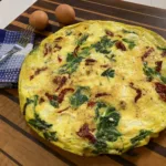 Frittata with Goat Cheese Sundried Tomatoes and Spinach Image