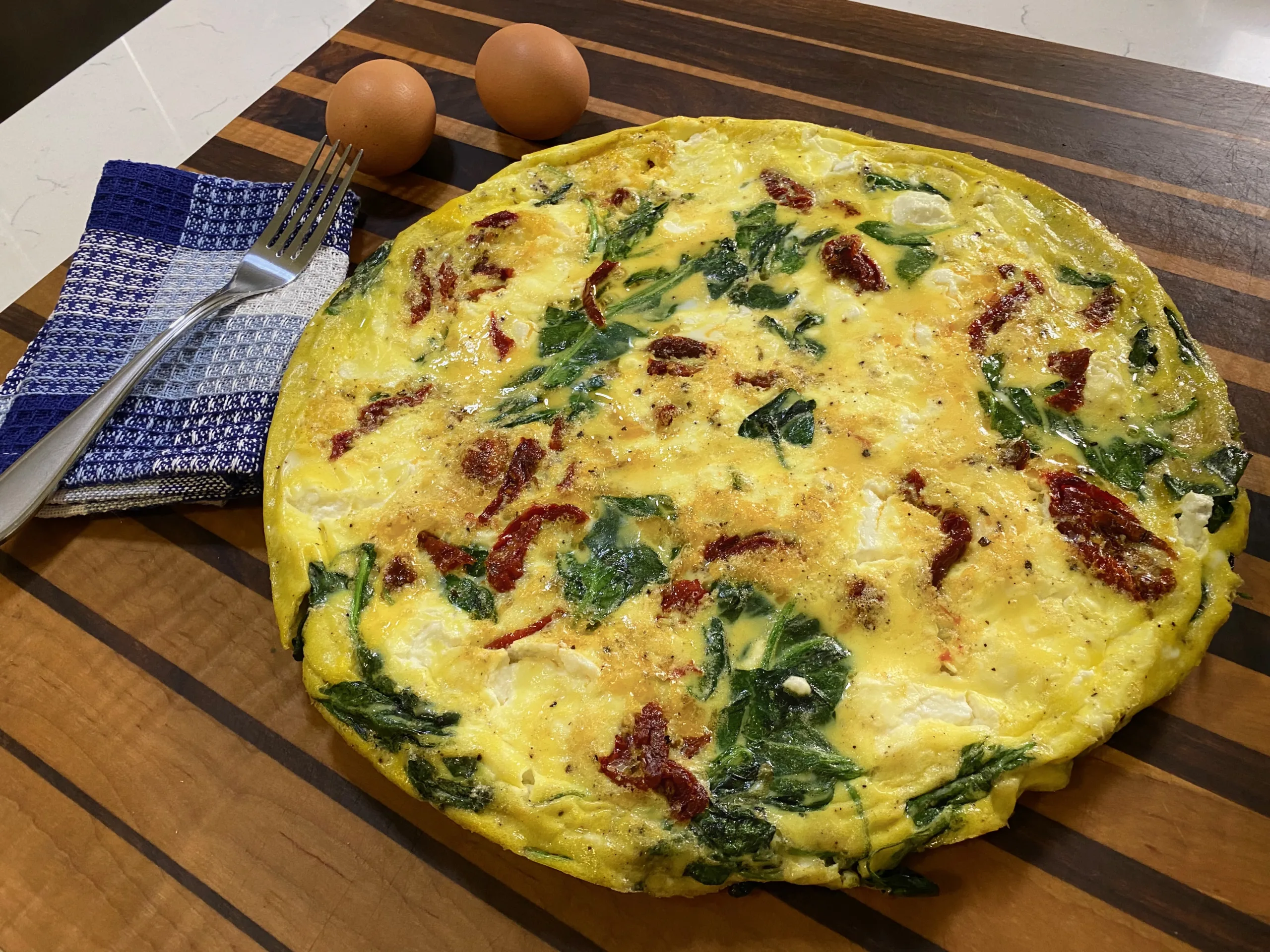 Frittata with Goat Cheese Sundried Tomatoes and Spinach Image