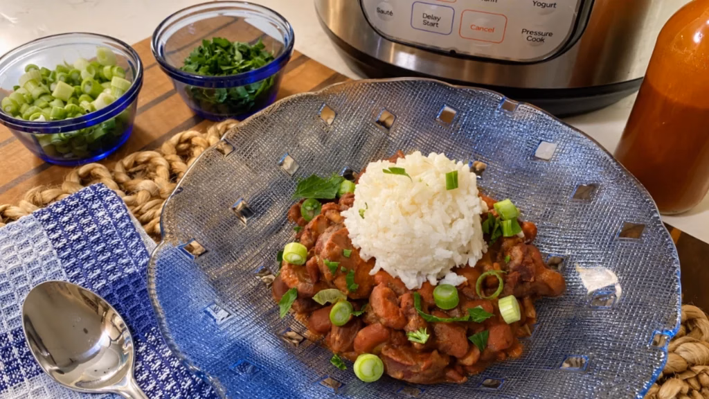 Instant Pot red beans and rice with Andouille sausage served in a bowl.