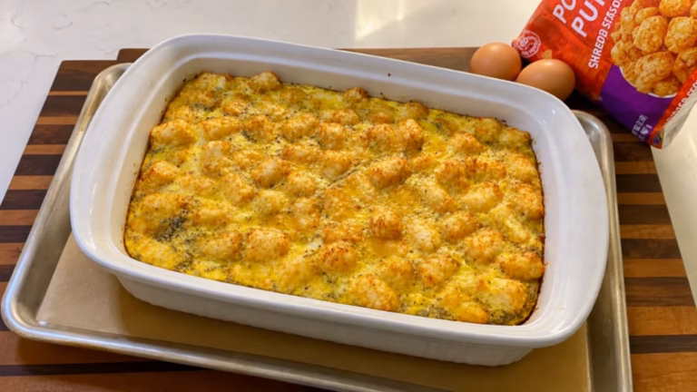 Tater tot breakfast casserole baked in a rectangular casserole dish.